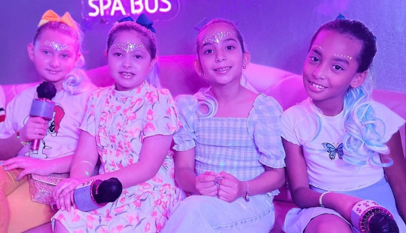 Girls celebrating a KPOP themed spa party on the Glam N' Party bus in Miami